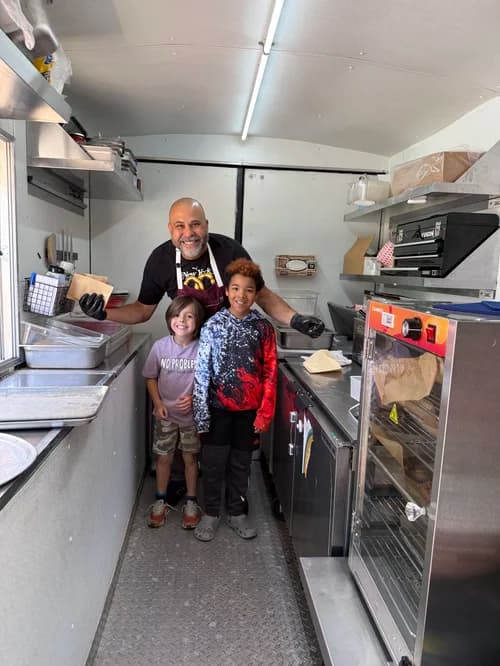 Merris Bros food and family at an event